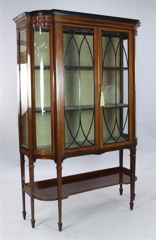 An Edwardian cross banded mahogany display cabinet, W. 3ft 8in. D. 1ft 6in. H. 5ft 10in.